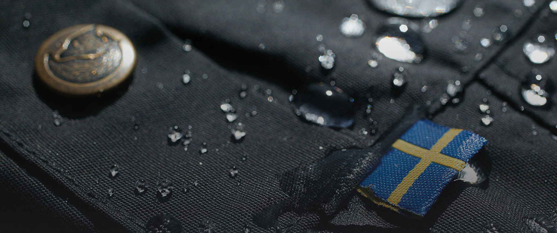 Closeup of G1000 fabric with stitched Swedish flag