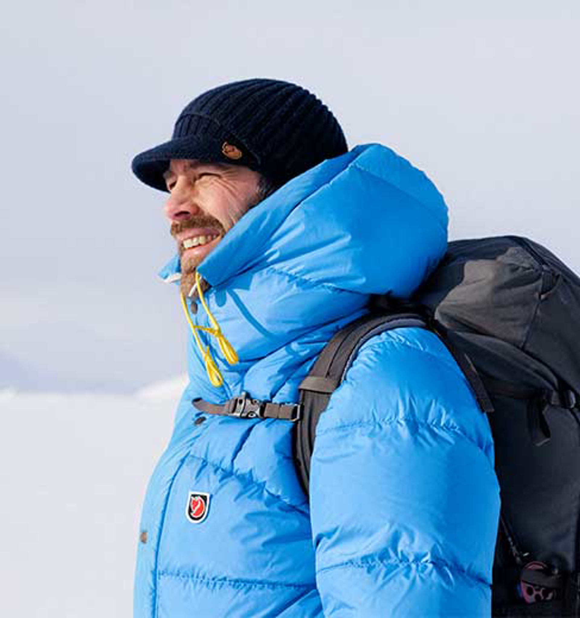 man wearing an expedition down lite jacket 